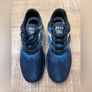 🆕 Yes We Vibe Women's Black and Gold Athletic Shoes